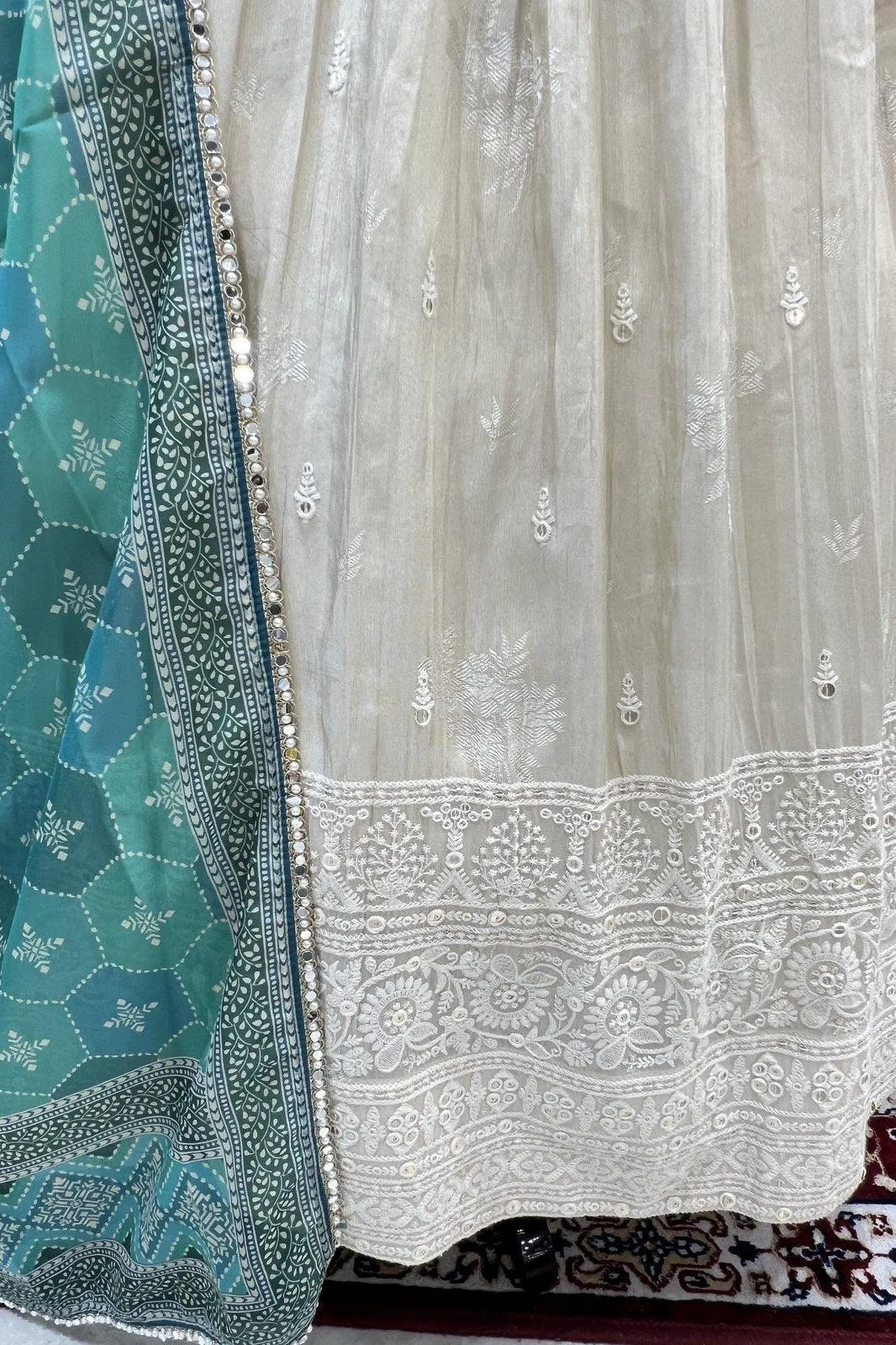 Cream Self Print, Sequins and Thread work Top with Lehenga