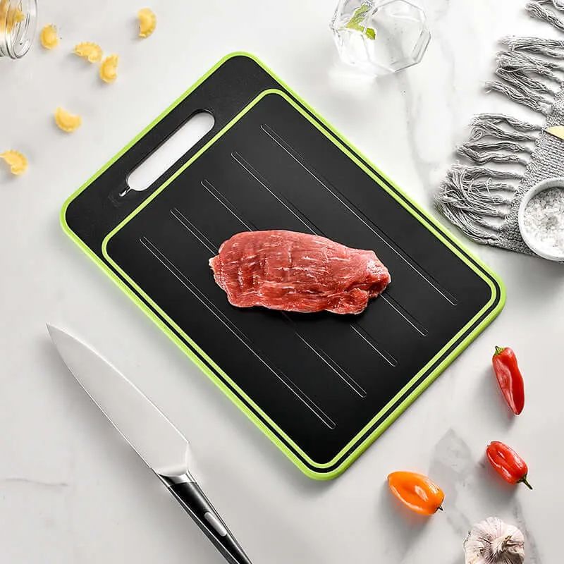 Double-sided cutting board with defrost function and knife sharpener