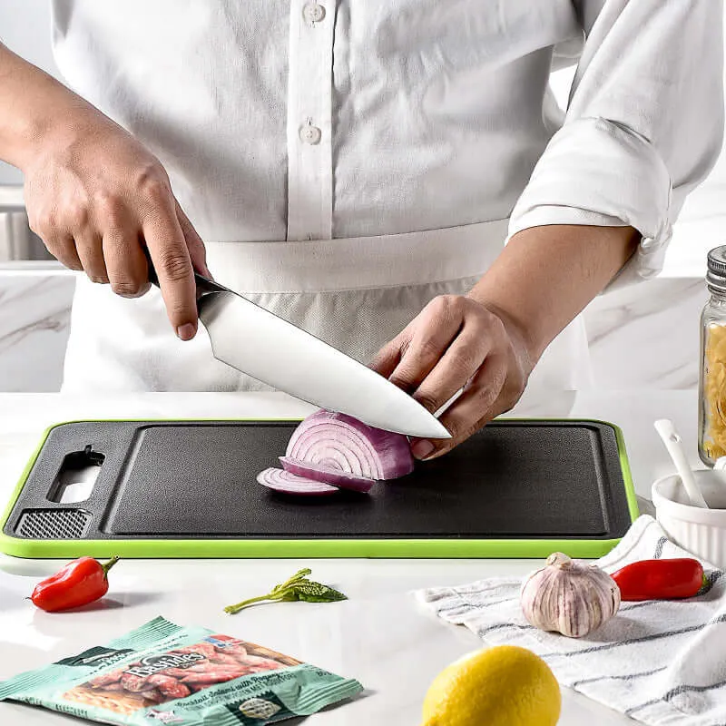 Double-sided cutting board with defrost function and knife sharpener